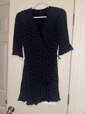 LOFT navy blue polka dot ruffle faux wrap romper - Size 4